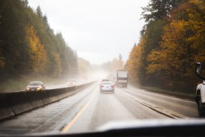 Driver's perspective of wet road and fall scenery in the Pacific Northwest USA.